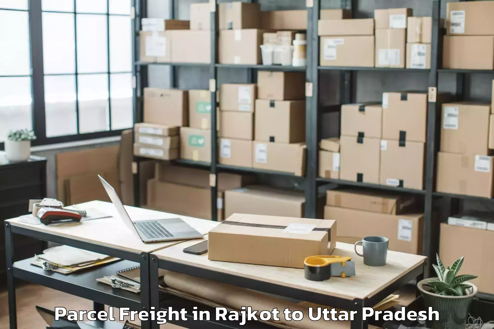 Quality Rajkot to University Of Allahabad Allaha Parcel Freight